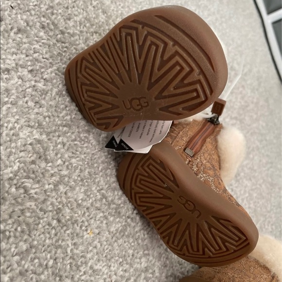 Two pairs brand new baby ugg boots